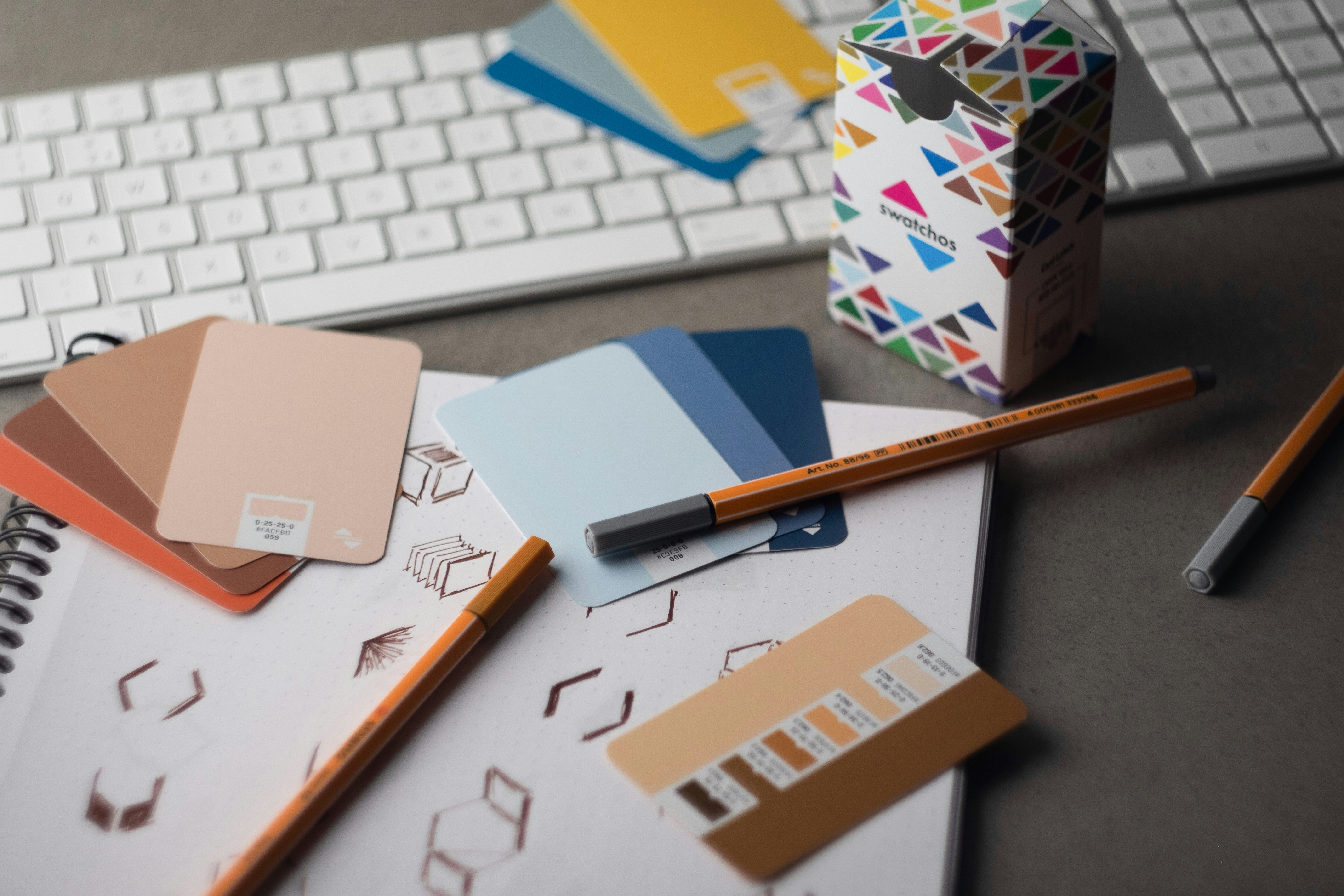 Brand color swatches and sketchbook